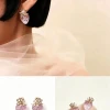 Small and niche texture transparent strawberry ear studs, gold and silver small flower zircon embellishments, three-dimensional earrings directly supplied by the manufacturer Application Scenario